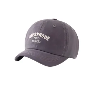 Charcoal grey kids baseball cap with white 3D embroidery showing Everyhour and Moment