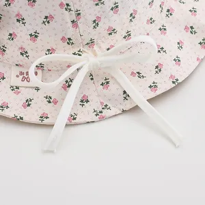 Floral baby sun hat with bow decoration and soft cotton fabric for 1-3 years old toddlers