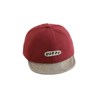 Infant soft brim baseball cap in red and beige with PUPPY embroidery for babies