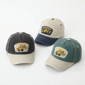 Kids baseball caps with excavator embroidery in gray, blue, and green colorblock design