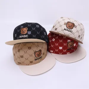 Detailed flat view of kids hip-hop snapback hats with cartoon bear embroidery
