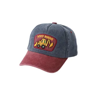 Kids baseball cap featuring a yellow excavator embroidery and contrast visor