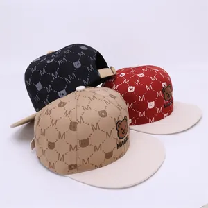 Kids baseball caps with cartoon bear and M prints in black, red and khaki colors