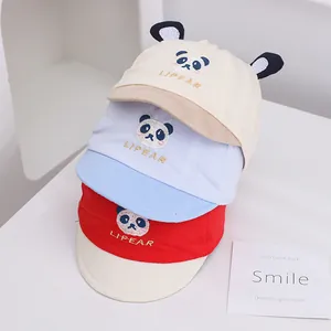 Detailed embroidery of panda motif and Lipear letters on soft cotton baby caps