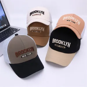 Detail of multi-color kids mesh baseball caps with Brooklyn New York 3D embroidery