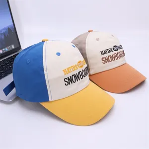 Kids color-block baseball caps with 3D embroidery and breathable cotton canvas material