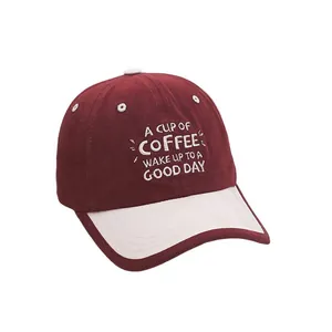 Kids baseball cap in burgundy and cream with embroidered coffee quote and curved brim