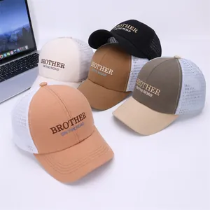 Detail of multi-color retro trucker hats with mesh back and embroidered road lettering