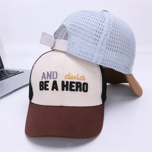 Detail of breathable mesh baseball caps with embroidery and adjustable velcro strap