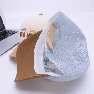 Detailed view of kids breathable mesh baseball cap with embroidered letters and adjustable strap