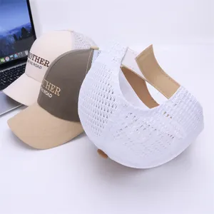 Close-up of breathable mesh baseball caps with adjustable velcro straps and embroidery