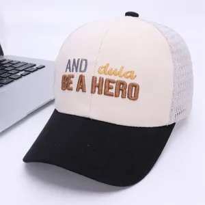 Close-up of tricolor baseball mesh cap with 3D letter embroidery and breathable mesh