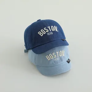 Detail of BOSTON 1630 3D embroidery on blue denim baseball caps for children