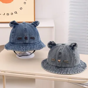 Detail of baby denim bucket hats with cute 3D ears and adjustable windproof cords