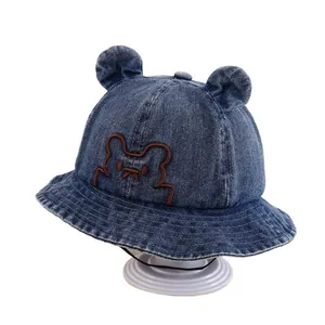 Blue denim baby bucket hat with 3D ears and embroidered bear face for sun protection