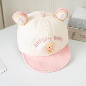 Cute baby baseball cap with bear ears and Happy Baby embroidery in cream and pink