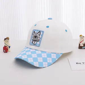 Detailed embroidery of cartoon dog and argyle pattern on children baseball cap