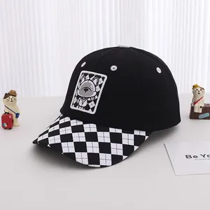 Kids baseball cap featuring black cotton with checkerboard brim and cartoon dog patch