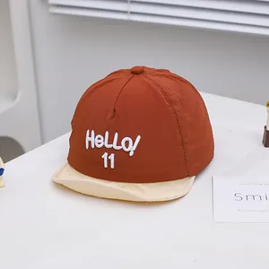 Detail of the Hello 11 3D embroidery on the contrast color baby baseball cap