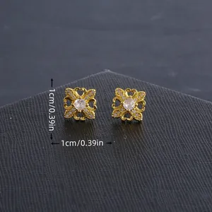 Micro zircon paved gold flower earrings with clover design measuring 1cm by 1cm