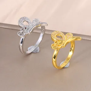 Eleganti anelli a farfalla in oro e argento con micro zirconi e finitura lucida