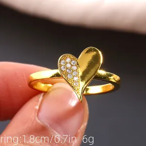 Elegant gold heart ring with micro-pave zircons, measuring 1.8cm diameter and 6g weight