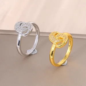 Elegant gold and silver double ring with micro-paved cubic zirconia for women