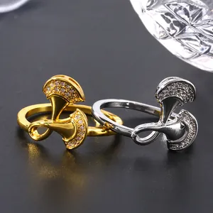 Elegant gold and silver ginkgo leaf rings with micro-paved cubic zirconia for women