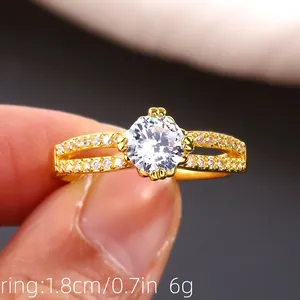 Luxurious gold-plated double-layer ring featuring a large round cubic zirconia stone