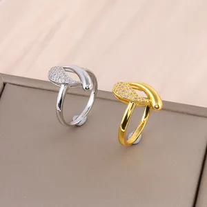Luxurious infinity teardrop rings in gold and silver finish with zircon micro-pave setting