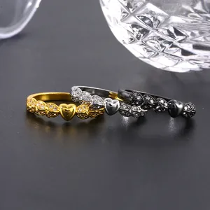 Three-piece heart ring set with micro-paved zircons in gold, silver, and black finish