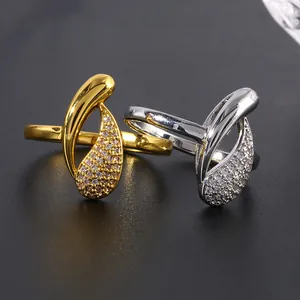 Elegant infinity teardrop rings in gold and silver with cubic zirconia micro-pave setting