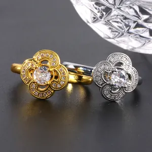 Luxurious four-leaf clover rings in gold and silver with sparkling micro-pave zircons
