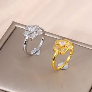 Elegant gold and silver five-petal flower rings with micro-set zircon stones