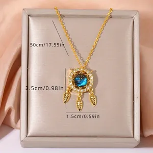 Detail of dreamcatcher pendant showing size measurements and blue zircon stones