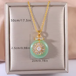 Detail view of 50cm gold chain and 2.5cm green flower pendant with cubic zirconia