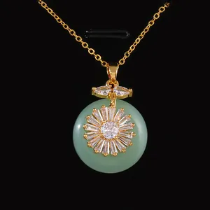Copper sunflower pendant necklace with green pi disc and micro-inset cubic zirconia