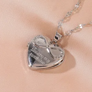 Collier médaillon cœur argenté avec gravure You Are My Sunshine et symbole infini