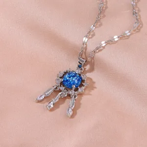Blue star dreamcatcher necklace with micro-paved cubic zirconia on champagne silk