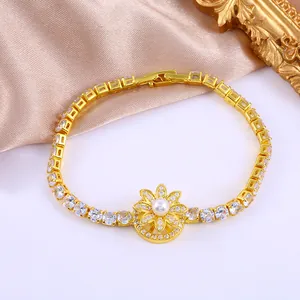 Bracelet doré élégant avec tournesol rotatif, perle et cristaux de zircon scintillants