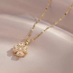 Elegant gold necklace with heart-shaped clover pendant pavé-set with clear cubic zirconia