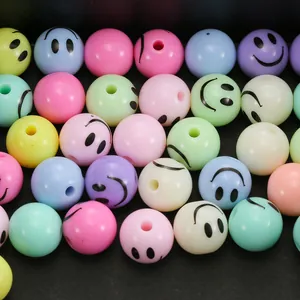 Close-up of colorful 12mm macaron smiley face beads for DIY jewelry making