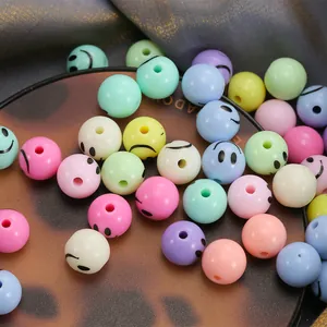 Macro shot of colorful 12mm smiley face round beads for DIY bracelet jewelry making