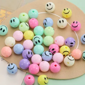 Close-up of colorful macaron acrylic smiley face beads for DIY jewelry making