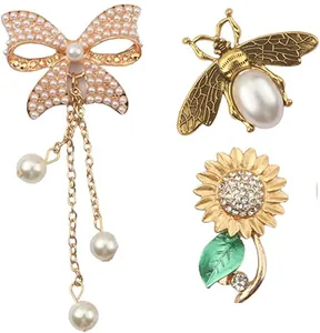 Macro view of crystal butterfly, bee and flower shoe charms with pearl tassels for clogs