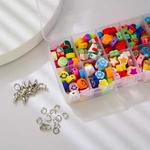 Kit de perles en pâte polymère colorée avec motifs sourire et fruits en boîte de 10 cases