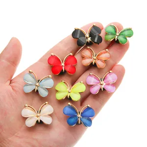 Colorful acrylic butterfly shoe charms for clogs with golden edges and glitter details