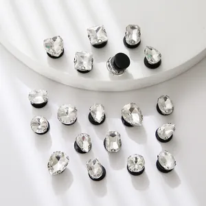 Macro detail of various crystal glass rhinestones in multiple shapes for DIY shoe decoration