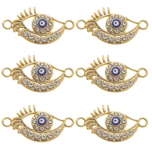 Lot de 6 breloques œil de protection dorées avec émail bleu et strass brillants en détail