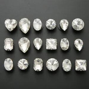 Assorted clear glass rhinestones in 18 shapes with silver metal claws for DIY shoes